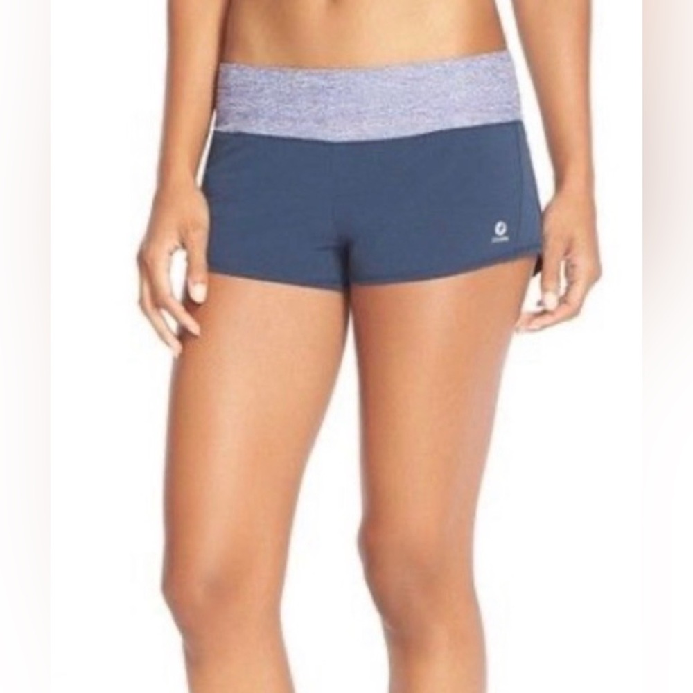 Oiselle Navy Mac Roga Shorts with a Purple Lux Waistband